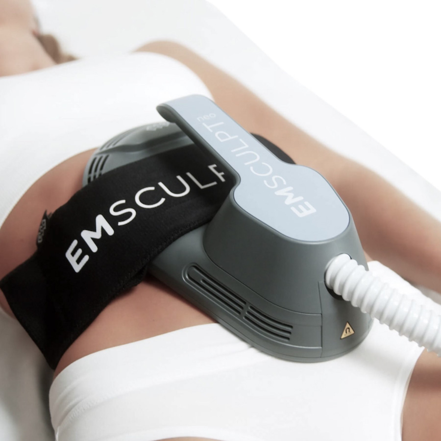 EMSculpt device on a patient's abdomen